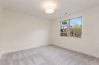 One of two bedrooms located on the second floor.