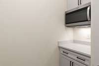 Perfect space for a coffee bar located in the kitchen pantry.