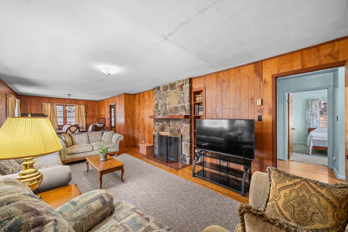 Large living room with rock fireplace