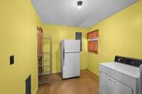 Laundry Room with access to carport