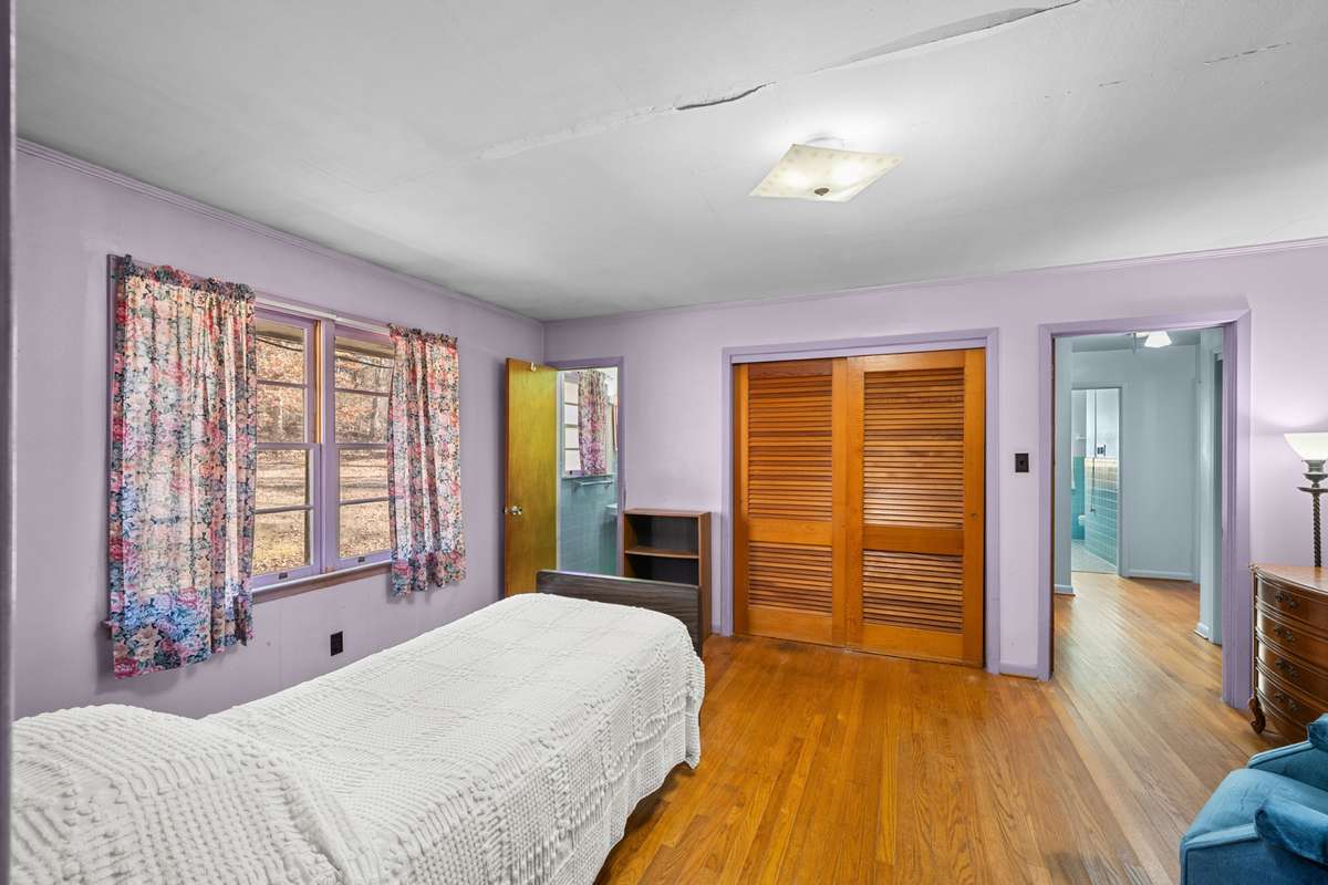 Primary Bedroom with half bath