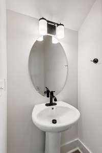 Beautiful matte black fixtures provide a clean, modern contrast to the white aesthetic, and it looks GREAT! Actual photo of home.