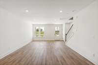 Think your furniture will fit in all this space? Actual photo of home.