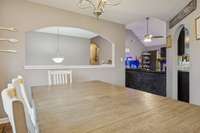 Dining room with natural light and easy access to both the kitchen and living room.