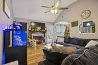 Open sight lines from the living room create a connected flow between the main living, dining, and kitchen areas.