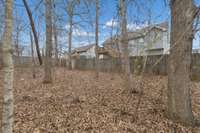 View of additional yard space that could have fence expanded to increase the size of the back yard.