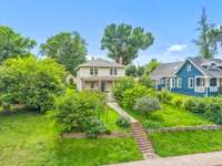 Walk down to sidewalk leading to downtown's 3 story restaurant bar and FM Bank Arena