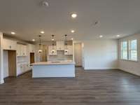 ***Photo taken on 12/9/25 to show current status of home construction***

Gourmet Kitchen and Dining