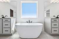***Photo from previously built home - options and colors may vary***

A freestanding tub offers a modern and relaxing space to unwind after work!