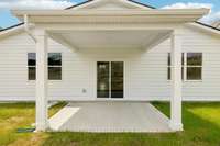 Enjoy your included rear patio that is covered, perfect for entertaining, dining or relaxing outdoors in any weather!