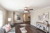 Plenty of room to create a cozy gathering space, media area, or a combination of both in this versatile living room.