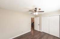 Generously sized guest room with flexibility for a bedroom, home office, or hobby space.