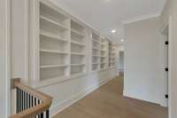 Built In Bookcases line the upstairs hallway