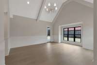 Massive Primary Bedroom w/ Volume Ceilings, Covered Patio Access, Walk In Closet and En Suite