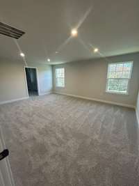 Primary bedroom is VERY spacious with TWO walk in closets