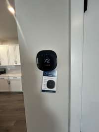 One of the many energy efficient items in this awesome home! Ecobee thermostats-easy to work from an app on your phone!