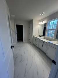 Spa like bathroom. Look at all that counterspace and storage!