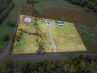 3.43 Acres with pond.