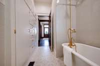 Original Clawfoot Tub Refurbished
All New Tile in Bathrooms