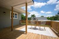 Covered Back Outdoor Entertainment Area w/ Trap Door to Storm Cellar