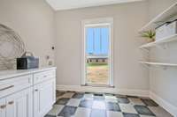 Walk In Chef's Pantry/Utility Room w/ Custom Cabinets 
New Laundry Chute