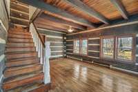 Front living room and stairway leads to upstairs bedrooms.