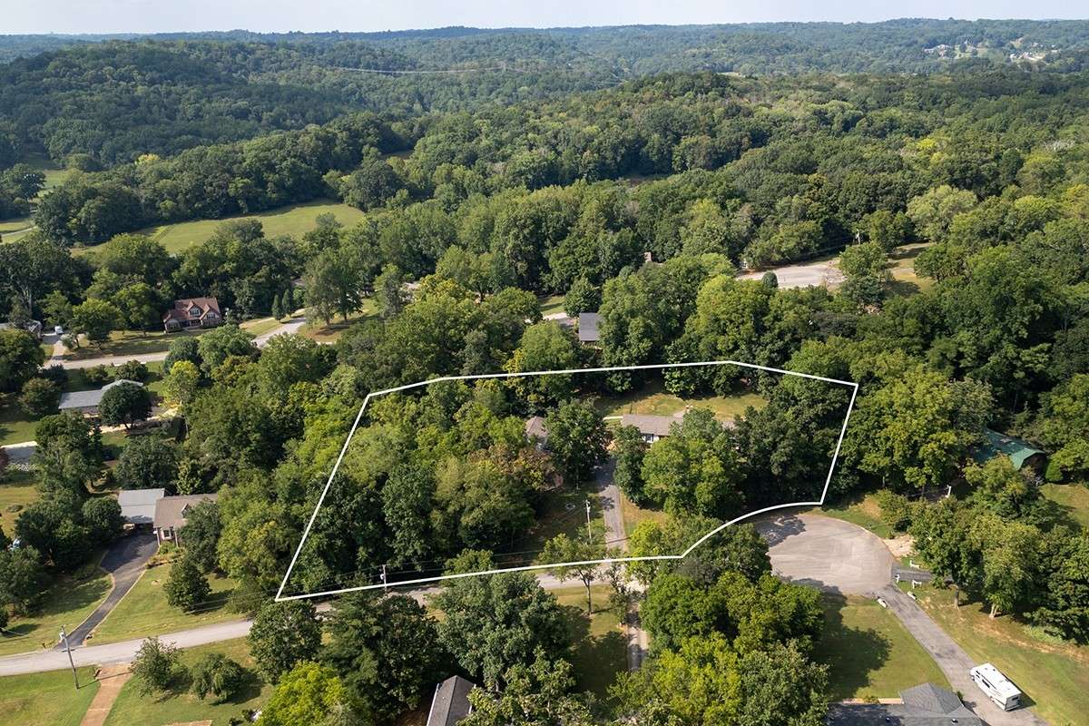 This sale includes the approx. 1 acre lot next door. These are estimated property lines ONLY.