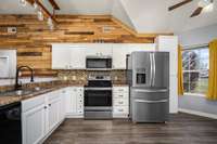 Tile backsplash and updated lighting/faucet.