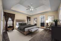 Example of the primary bedroom virtually staged with furniture.