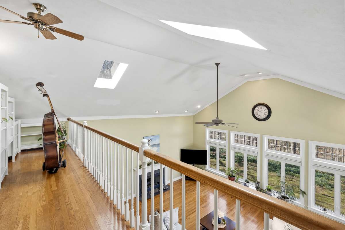 Loft/Overlook (Alternate View) – Elevated loft area offers a unique vantage point with natural light and open sightlines, providing flexible space for work, hobbies, or additional living use.