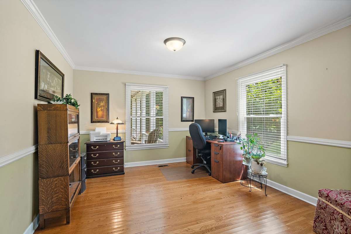 Office/Flex Room – Currently used as a home office, this flexible space features hardwood floors, natural light, and an open flow to the dining area. Easily adaptable as a sitting room, den, or formal living space.