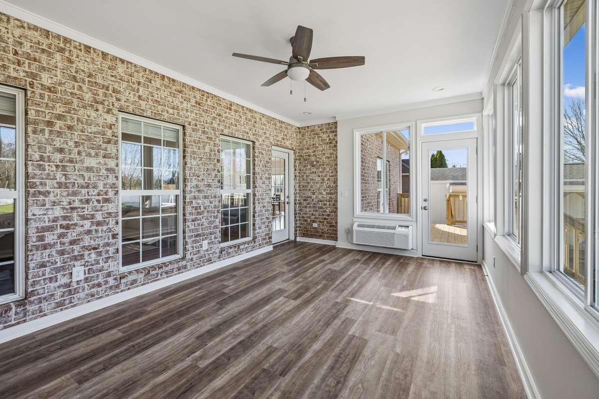 Fully Enclosed Sun Room - Heated and Cooled ( Windows Open to fully enjoy spring / fall weather )
