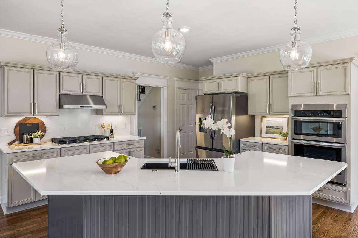 Large Open Kitchen with Sitting Area - One of if not the best room to gather and fellowship with friends and family.  This is a rare floor plan - ALL new Appliances, countertops, lighting and plumbing features
