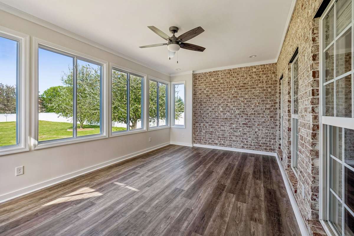 Fully Enclosed Sun Room - Heated and Cooled ( Windows Open to fully enjoy spring / fall weather )