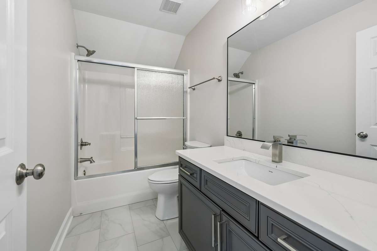 All tubs/showers have newly installed Glass Sliding Doors