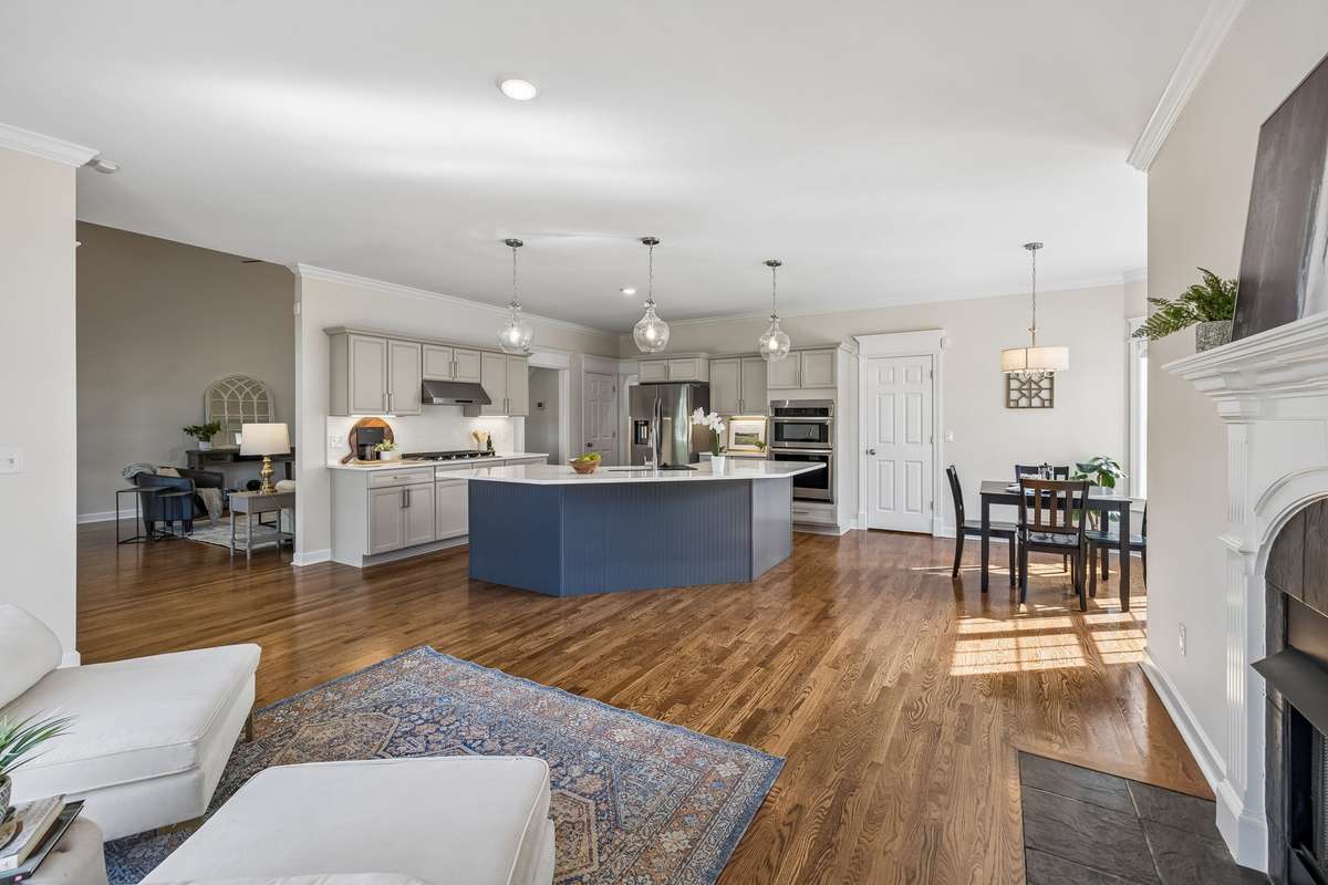 Large Open Kitchen with Sitting Area - One of if not the best room to gather and fellowship with friends and family.  This is a rare floor plan - ALL new Appliances, countertops, lighting and plumbing features