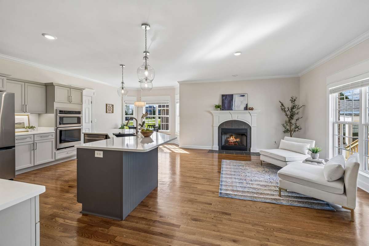Large Open Kitchen with Sitting Area - One of if not the best room to gather and fellowship with friends and family.  This is a rare floor plan - ALL new Appliances, countertops, lighting and plumbing features