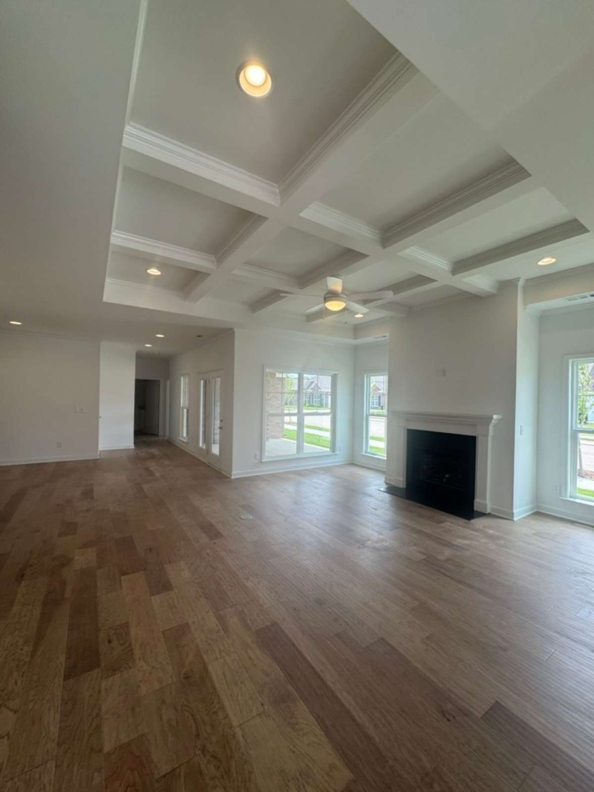 Beautiful open living/dining/kitchen layout with a coffered detail ceiling
Previously built home, options and selections may vary