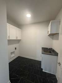 Main level laundry located just outside of the primary bedroom
Previously built home, options and selections may vary