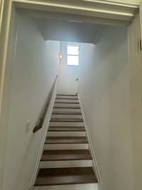 Hidden stairs to second level
Previously built home, options and selections may vary