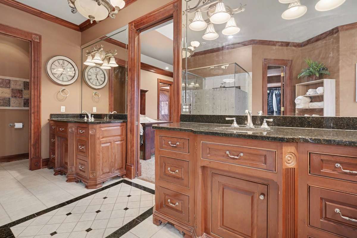 his/her counter areas primary bathroom