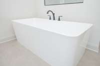 Relax your cares away in this just the right size soaking tub!