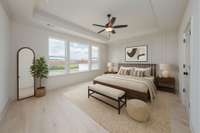 Ample sized primary bedroom-virtually staged