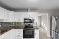 View from kitchen into front living area