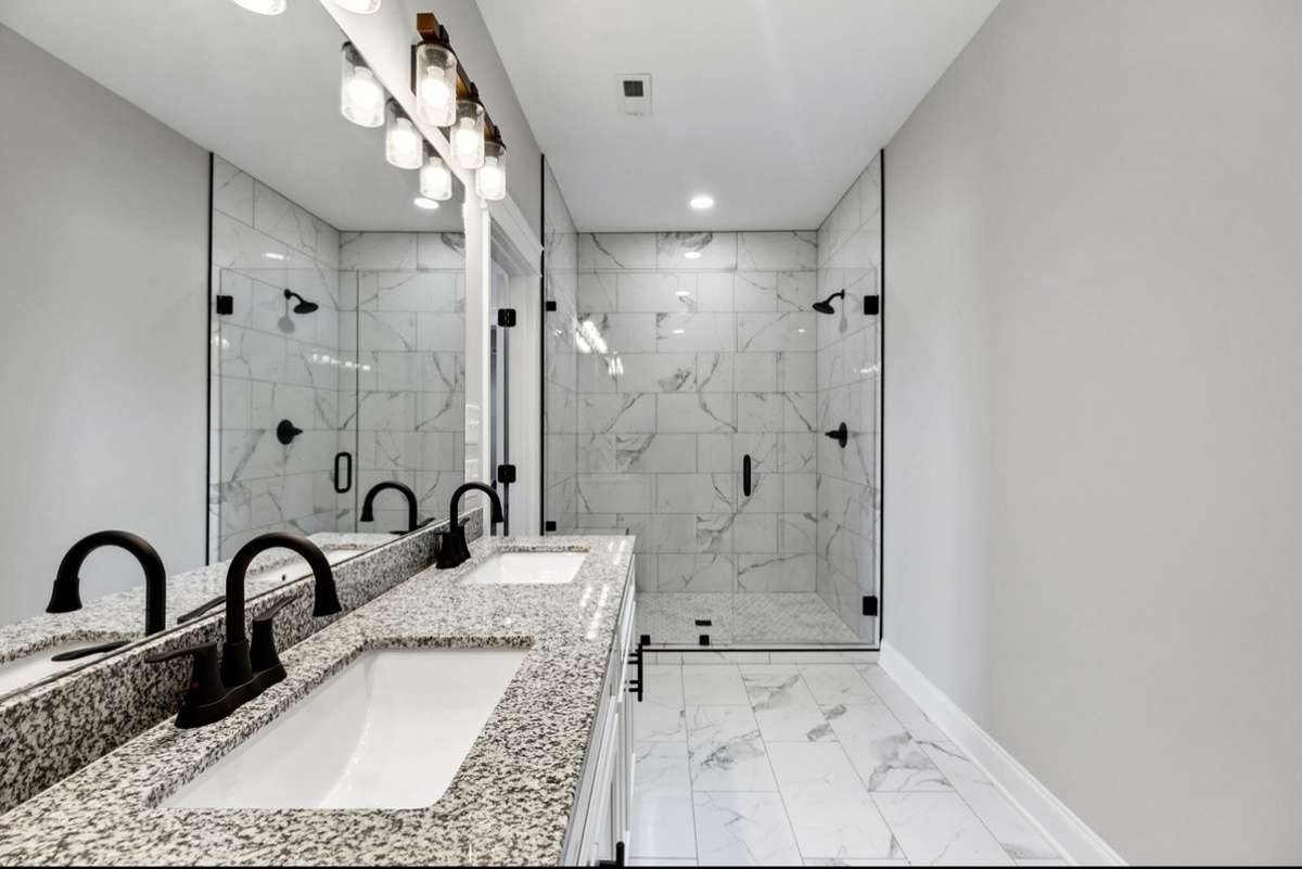 Primary Bathroom with double vanities and extra large shower