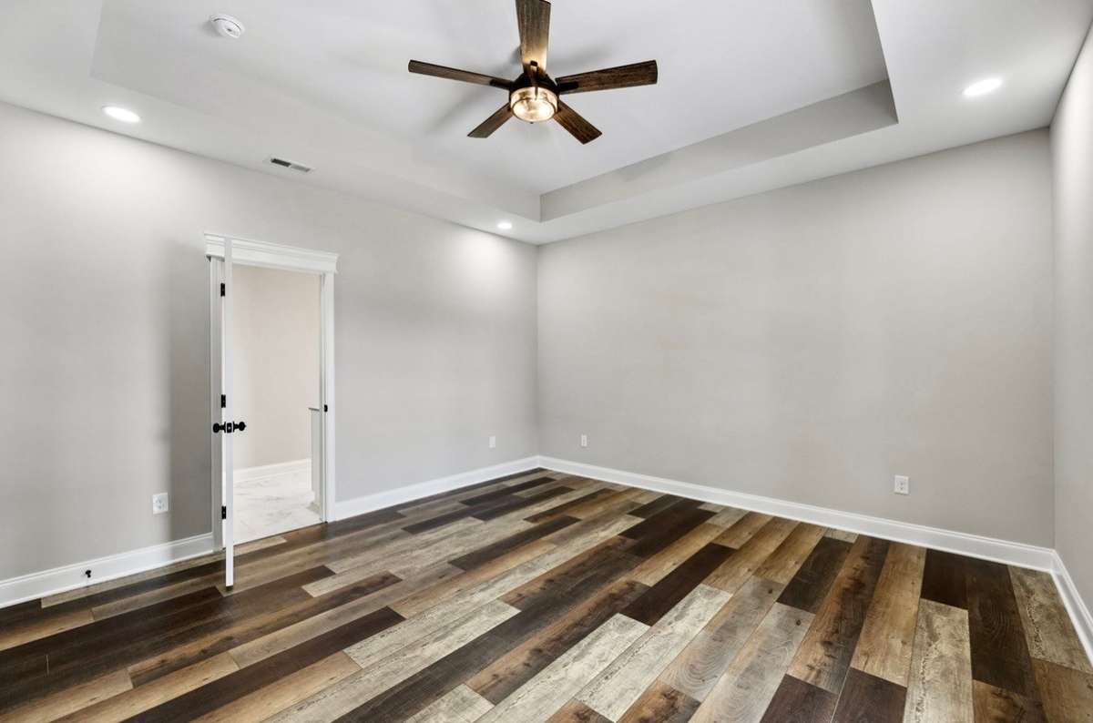 Primary Bedroom with Trey Ceilings