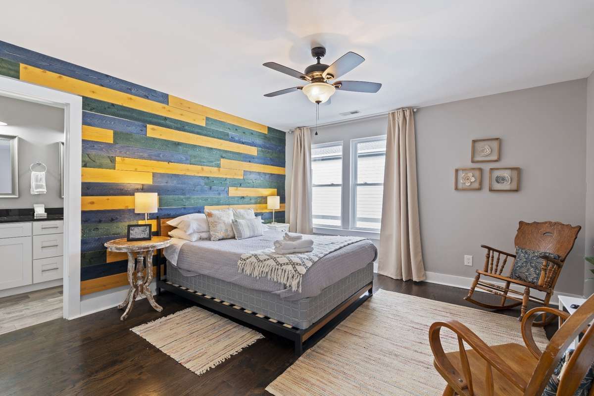Another view of the primary bedroom