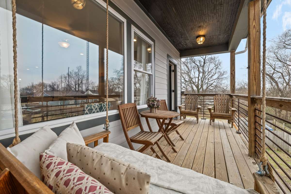 Large top deck with a big porch swing