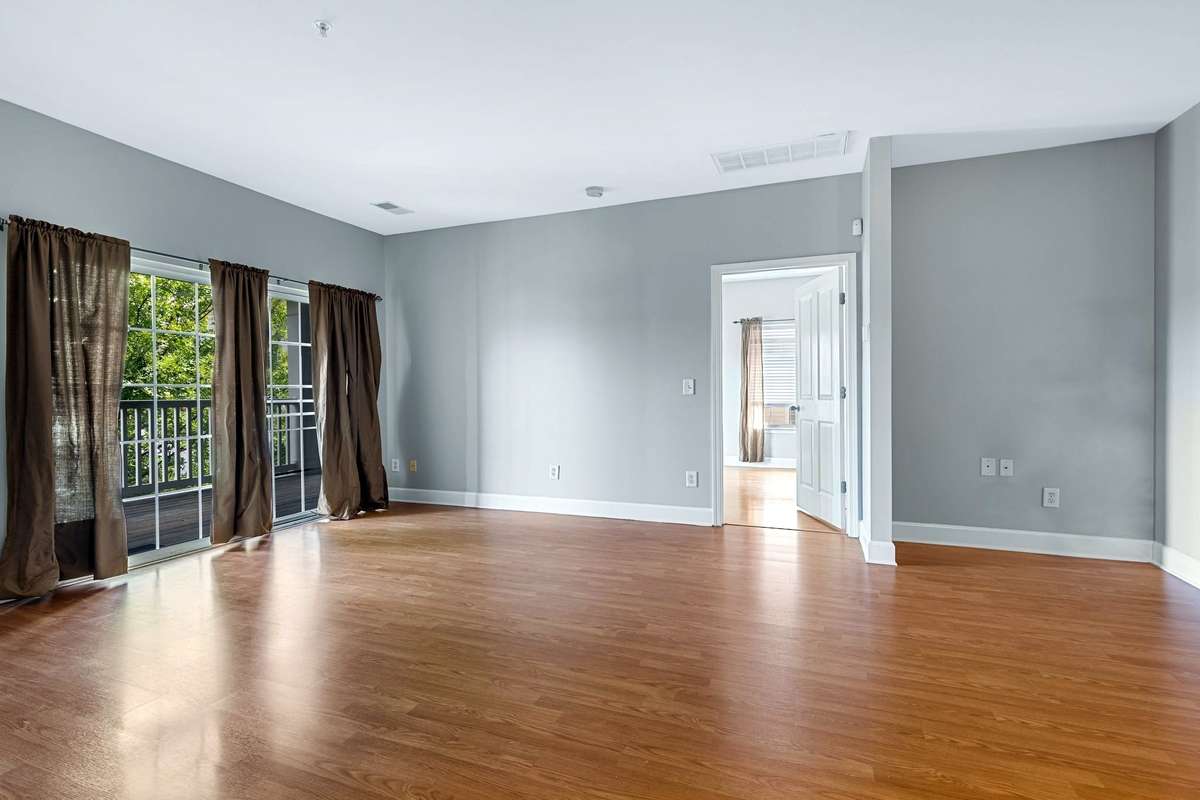 Enjoy the living room's quick access to the private balcony. Perfect for morning coffee or relaxing evenings.