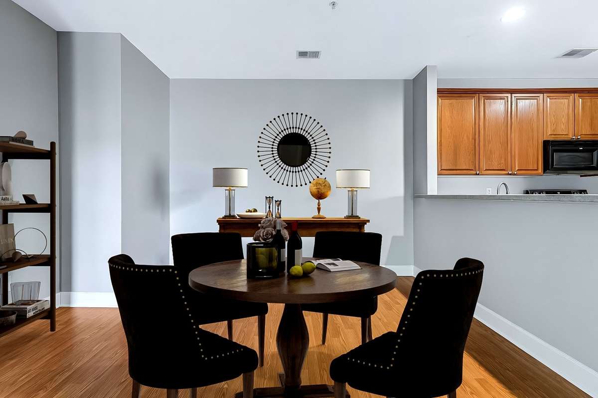 This is a virtually staged photo of the dining room.